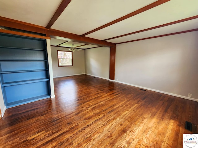 705-709 S Park Ave, Sedalia, MO 65301 - empty room featuring beamed ceiling, wood finished floors, a ceiling fan, baseboards, and built in shelves