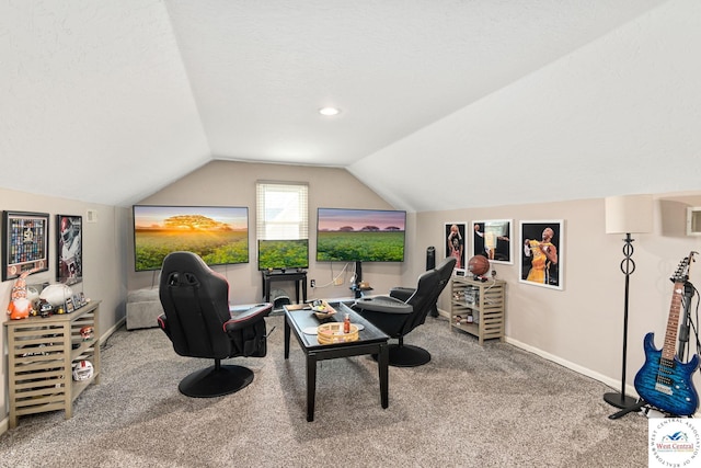 interior space with baseboards, lofted ceiling, and carpet flooring