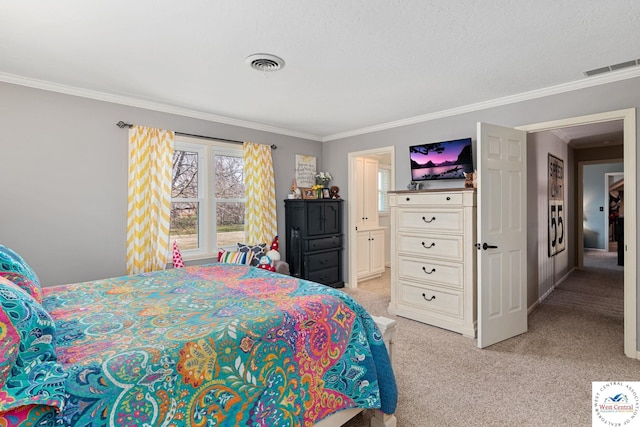 bedroom featuring crown molding, visible vents, and light carpet