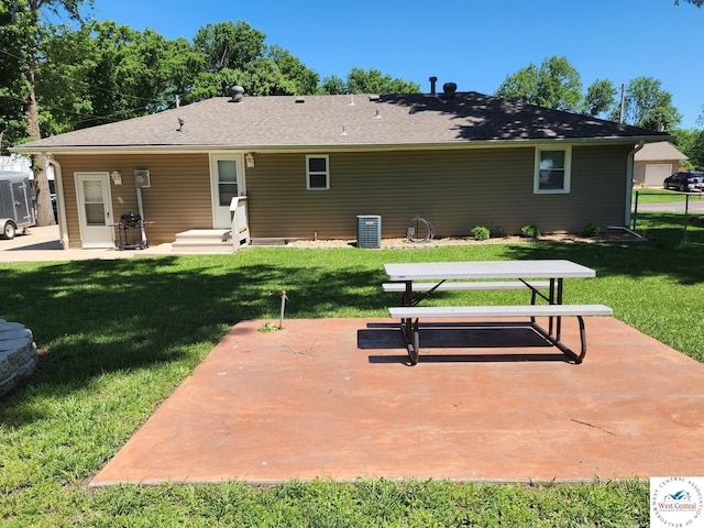 810 E Cedar St, Clinton, MO 64735 - rear view of property with a patio area, entry steps, and cooling unit