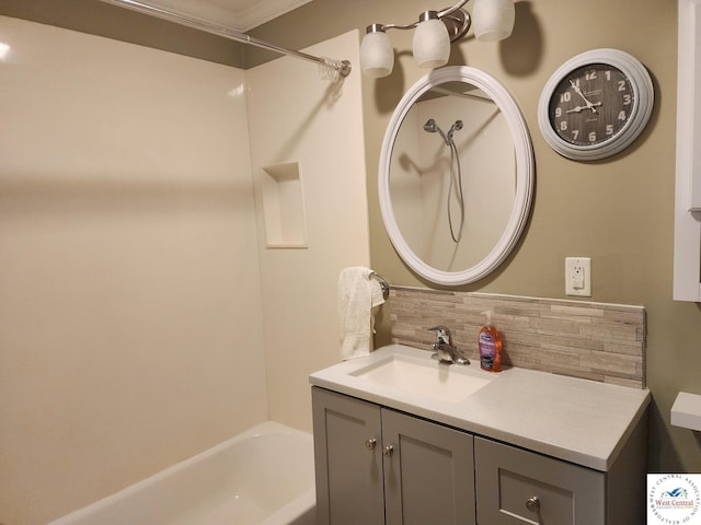 810 E Cedar St, Clinton, MO 64735 - full bathroom with tasteful backsplash, vanity, tub / shower combination, and ornamental molding