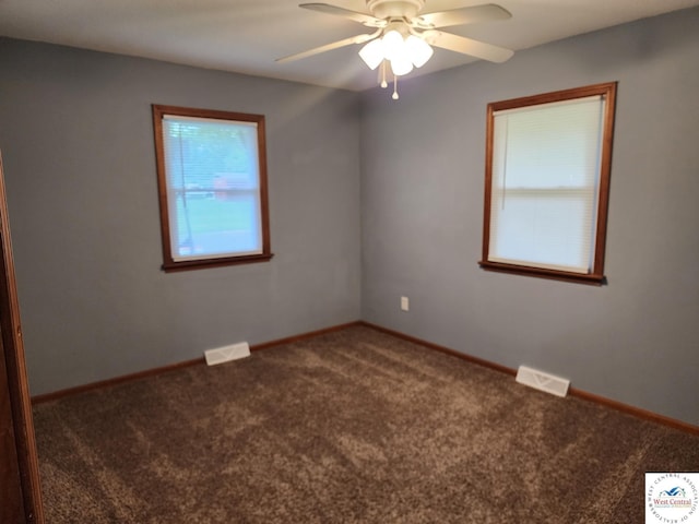 810 E Cedar St, Clinton, MO 64735 - spare room with carpet, a ceiling fan, and baseboards