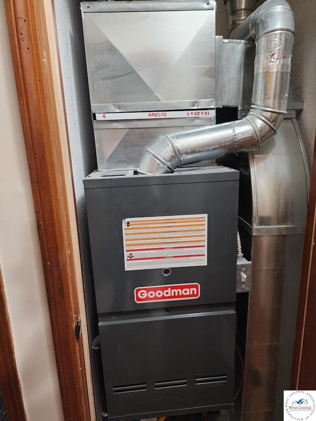 810 E Cedar St, Clinton, MO 64735 - utility room featuring heating unit