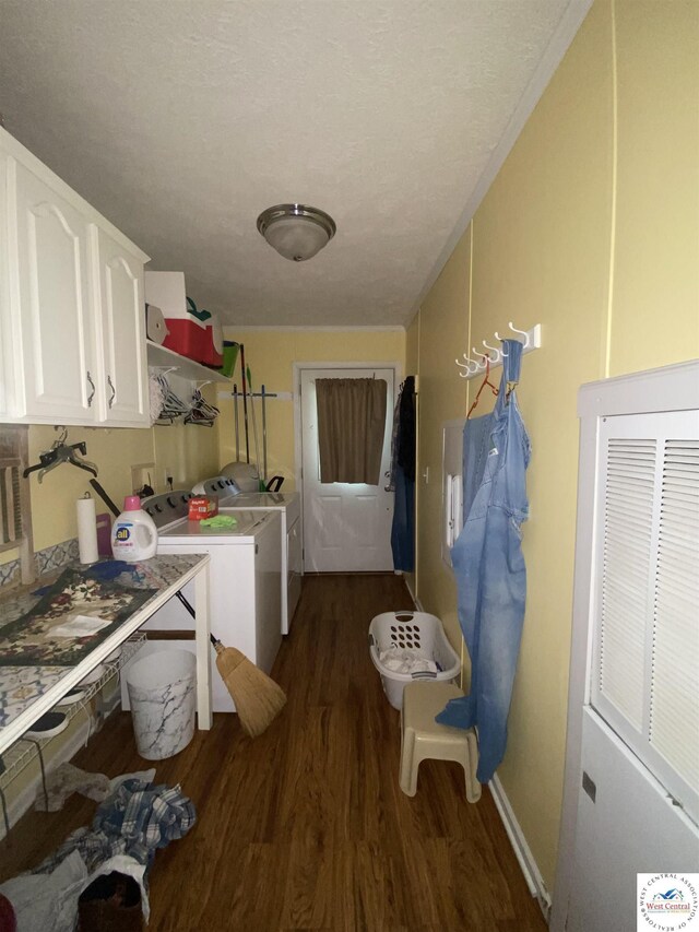 715 Ww Hwy, Osceola, MO 64776 - laundry room with cabinet space, washer and clothes dryer, wood finished floors, and baseboards