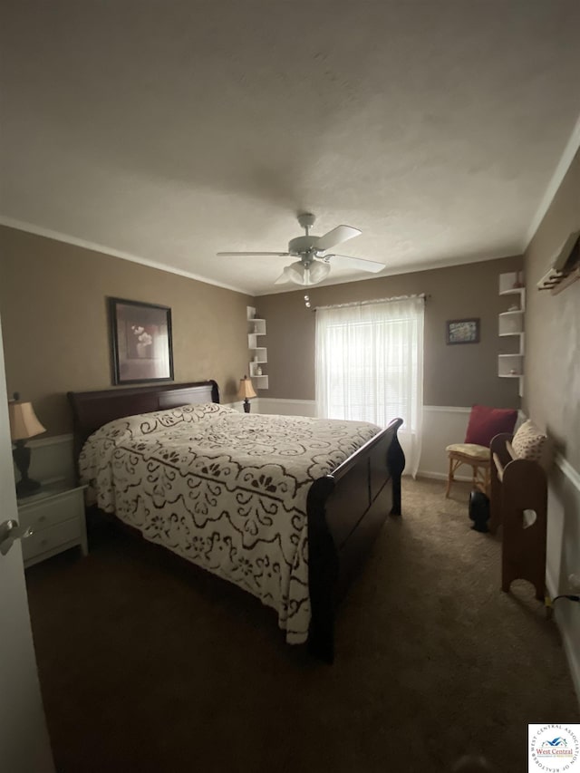715 Ww Hwy, Osceola, MO 64776 - bedroom with ornamental molding, dark carpet, and a ceiling fan