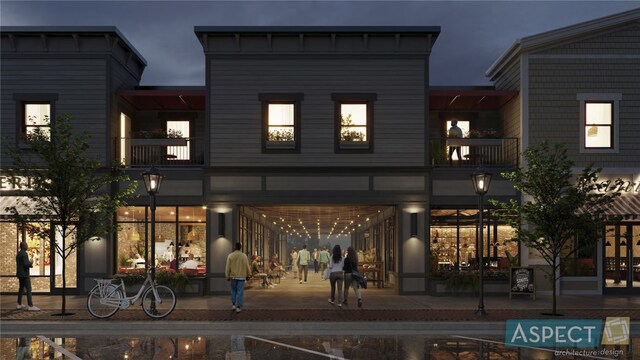 1500 Main St Unit 202, Ely, IA 52227 - back of house at night with a balcony