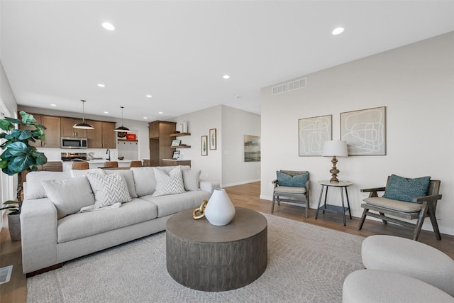 living room with hardwood / wood-style flooring