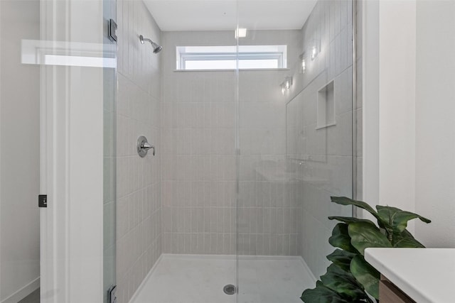 bathroom featuring vanity and walk in shower