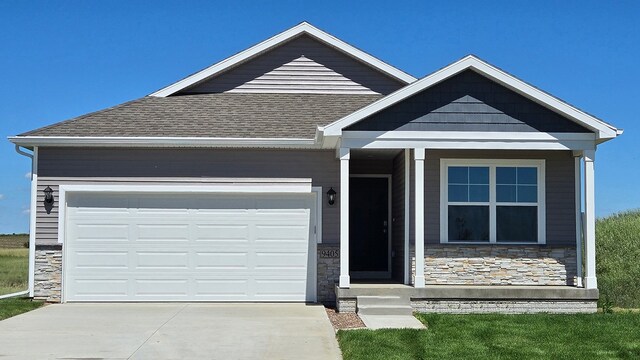 craftsman-style home featuring a garage