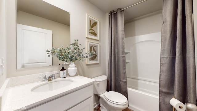 full bathroom featuring shower / bath combination with curtain, toilet, and vanity