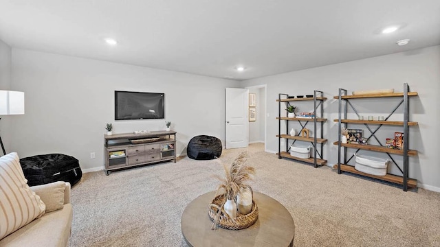 608 Maddie Ln, Tiffin, IA 52340 - carpeted living room with baseboards and recessed lighting