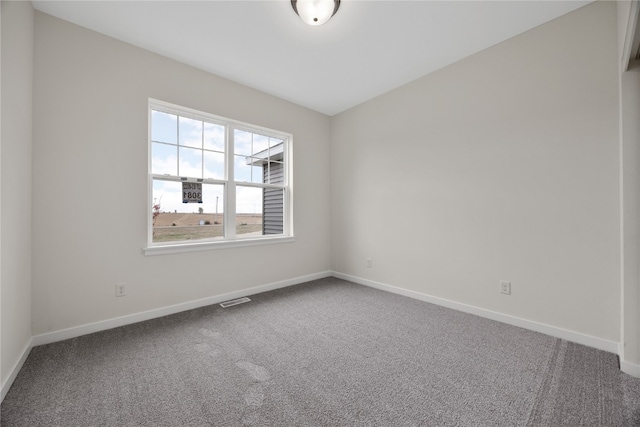 view of carpeted spare room