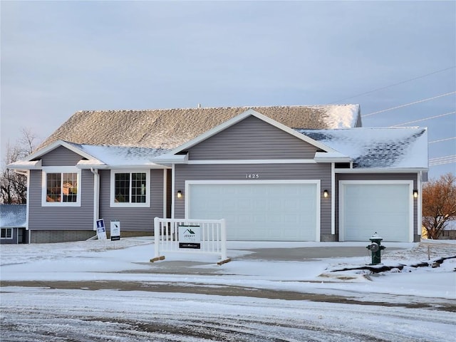 ranch-style home with a garage