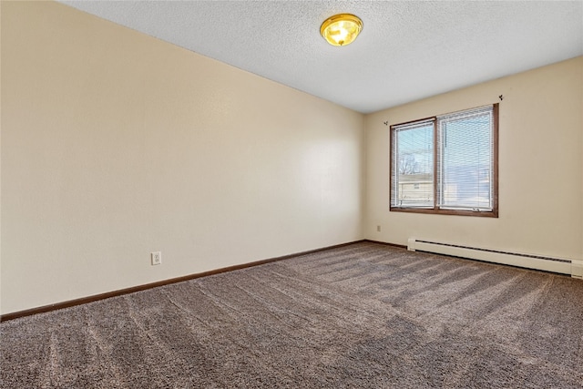 spare room featuring carpet flooring and a textured ceiling