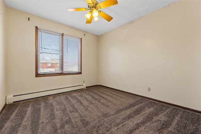 unfurnished room featuring ceiling fan, baseboard heating, and dark carpet