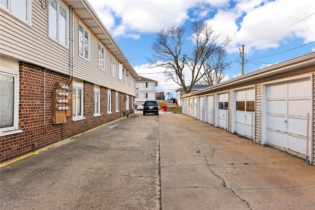 view of property exterior with a garage