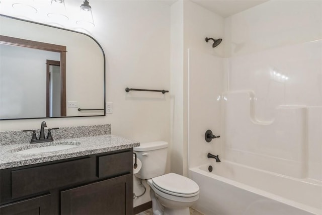 bathroom featuring shower / tub combination, toilet, and vanity