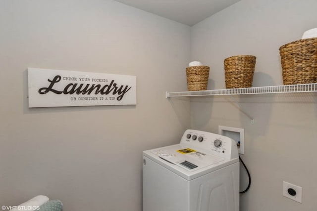 washroom with washer / clothes dryer and laundry area