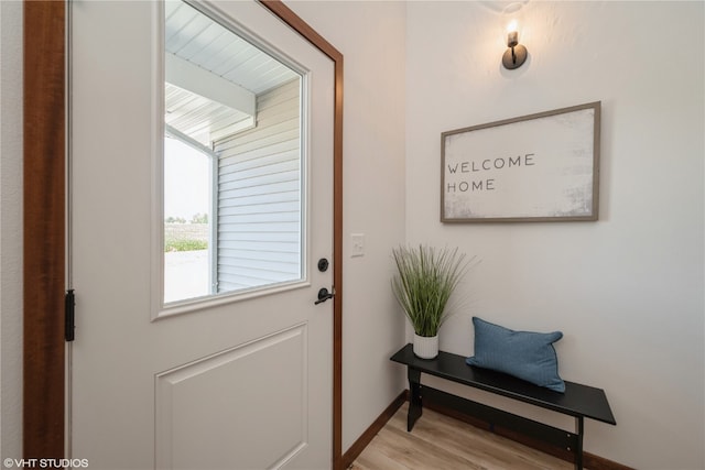 entryway with light hardwood / wood-style flooring