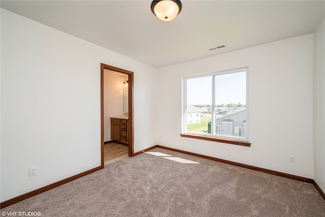 view of carpeted spare room