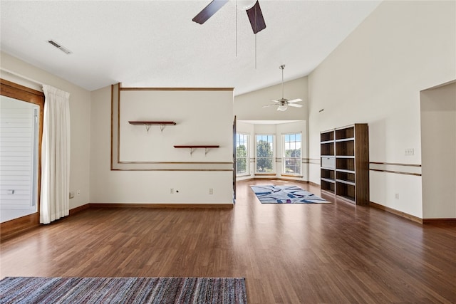 unfurnished living room featuring dark hardwood / wood-style floors, high vaulted ceiling, and ceiling fan