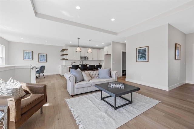 living room featuring light wood-type flooring