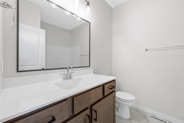 bathroom featuring baseboards, visible vents, toilet, marble finish floor, and vanity