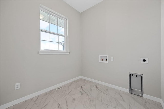 clothes washing area with hookup for a washing machine, hookup for an electric dryer, laundry area, baseboards, and marble finish floor