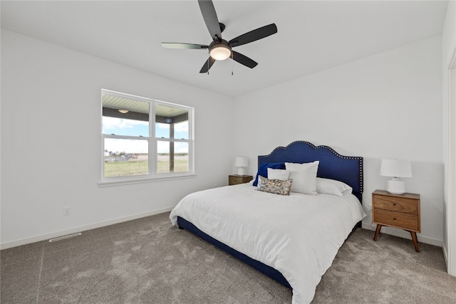 bedroom featuring ceiling fan and carpet floors