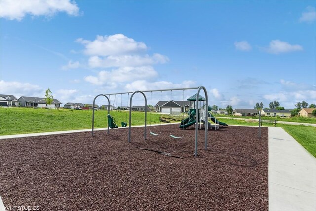 view of jungle gym featuring a lawn