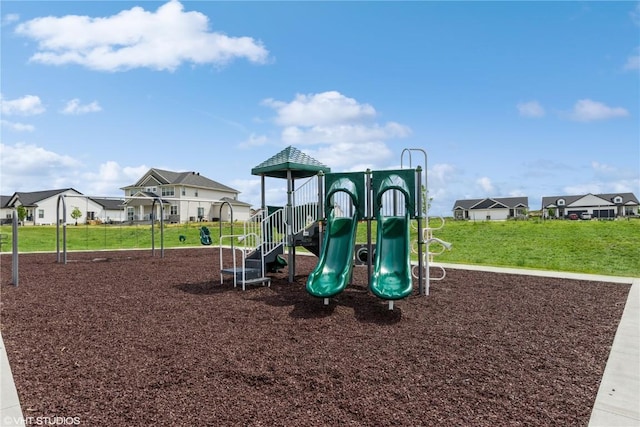 view of jungle gym featuring a yard