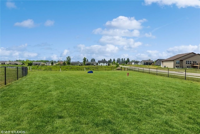 view of yard with a rural view