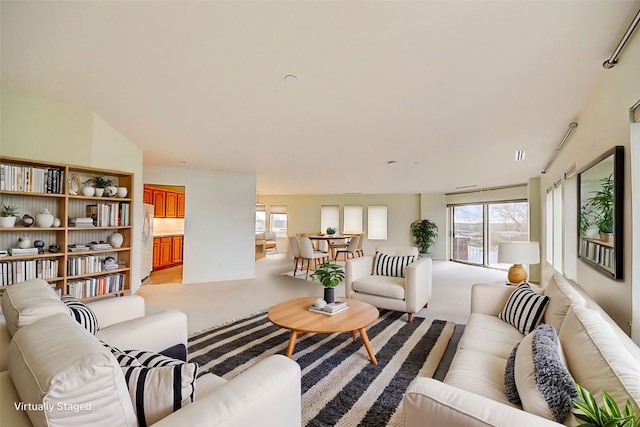 living room with light colored carpet