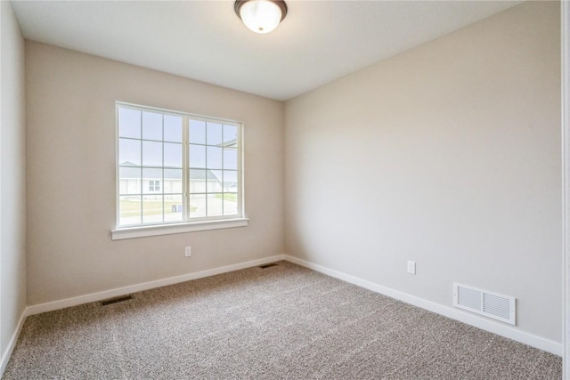 unfurnished room featuring carpet floors