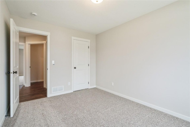 unfurnished bedroom with carpet