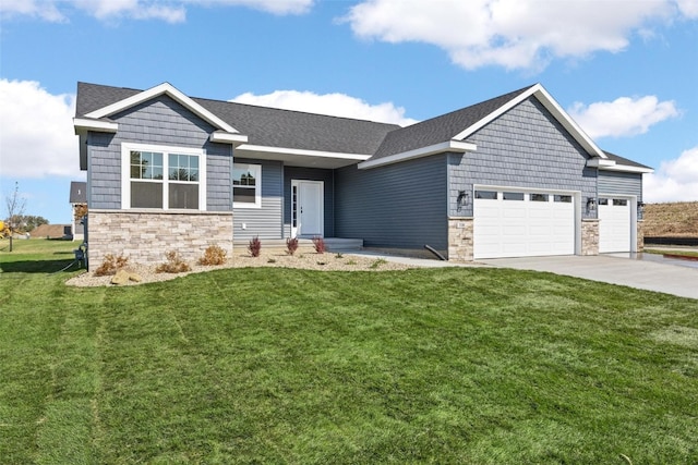 craftsman-style home featuring a front yard and a garage