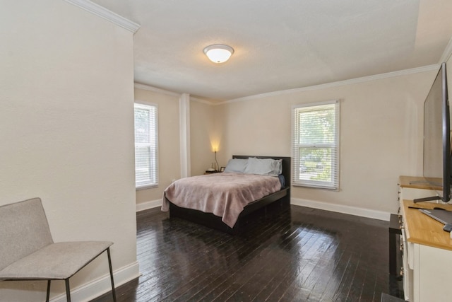 bedroom featuring dark hardwood / wood-style flooring and crown molding