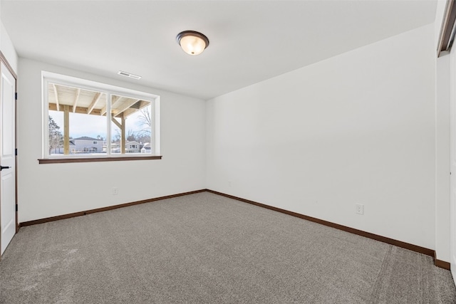 2733 Brookfield Dr, Marion, IA 52302 - carpeted spare room with baseboards