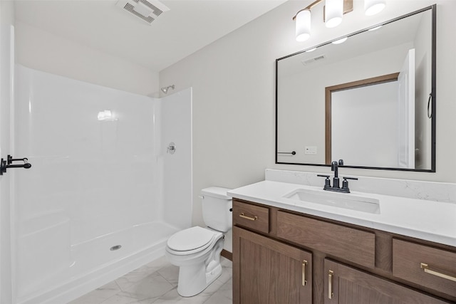 2733 Brookfield Dr, Marion, IA 52302 - bathroom with marble finish flooring, vanity, toilet, a shower, and baseboards