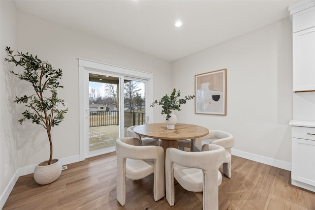 2733 Brookfield Dr, Marion, IA 52302 - dining space with light wood-style flooring, baseboards, and recessed lighting