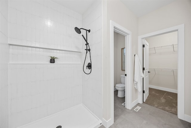 2733 Brookfield Dr, Marion, IA 52302 - bathroom with toilet, a shower stall, and a spacious closet