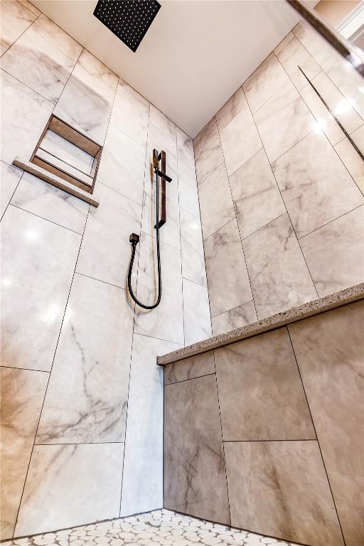 interior details featuring walk in shower