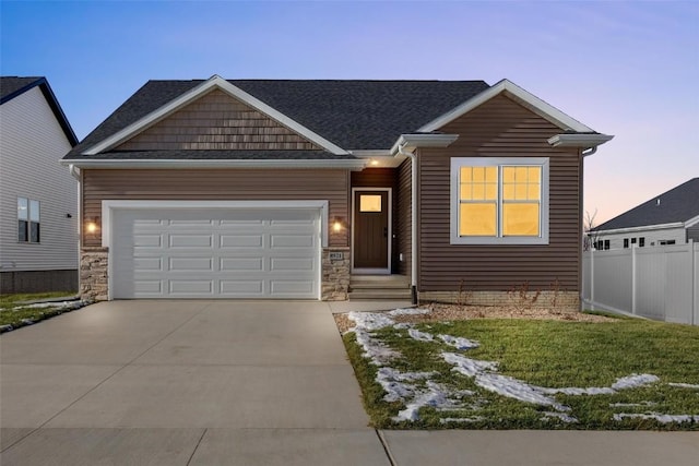 view of front of home with a garage