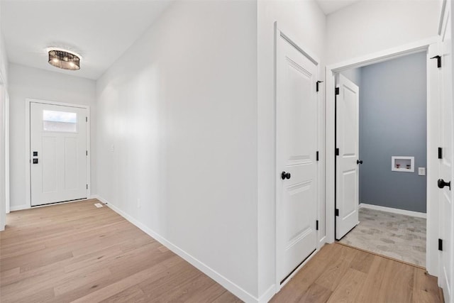 foyer entrance featuring light hardwood / wood-style floors