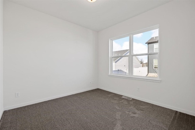 view of carpeted spare room