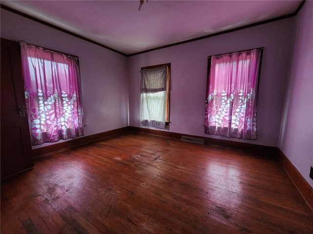 empty room with dark wood-type flooring