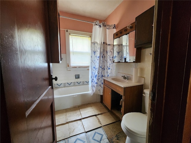 full bathroom featuring tile flooring, shower / bath combination with curtain, toilet, and large vanity