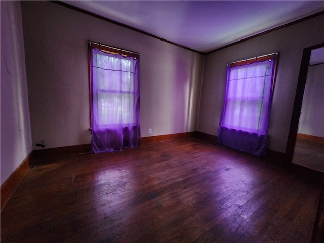 empty room featuring dark wood-type flooring