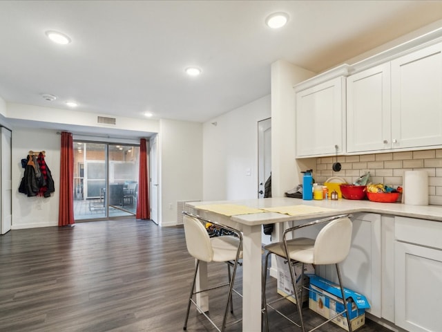 interior space with dark hardwood / wood-style flooring