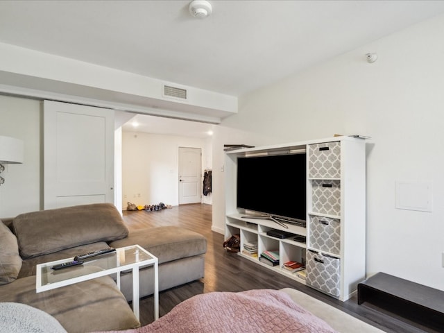 living room featuring dark hardwood / wood-style floors